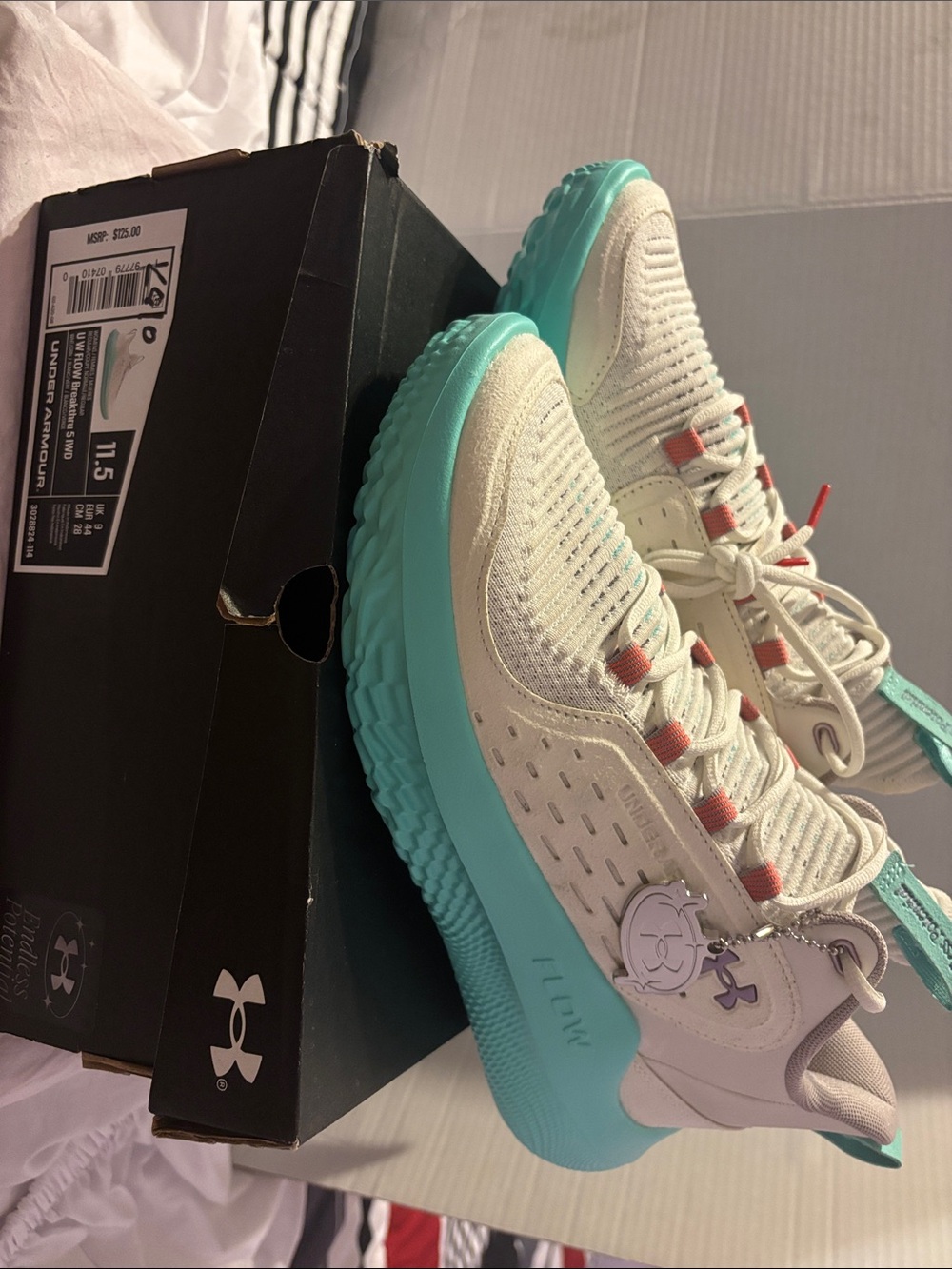 Under Armour Women’s Ivory & Teal Athletic Shoes with Coral Accents